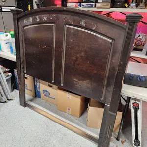 lot 304 image: Queen size headboard, footboard, box springs, 2 mattress one is a Pro-Comfort pillow top, 2nd one is pillowtop has Pepsi stains)