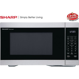 lot 5580 image: Sharp 1.1 CF Countertop Microwave Oven RETAIL $149.52