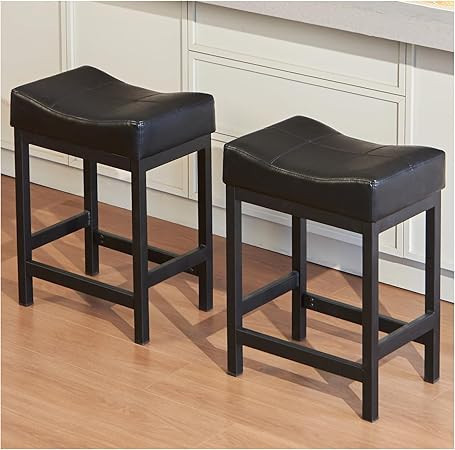 lot 5570 image: Bar Stools Set of 2,24 Inch Counter Height Stools,Saddle Stools,Metal Frame Bar Stools with Footrest, PU Leather Modern Kitchen Barstools for Kitchen Island,Counter, Pub RETAIL $79.99