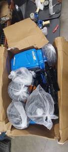 lot 10055 image: 24V Ride On Car for Kids,2 Seater Electric Truck with Remote Control, 4x45W Powerful Engine, Battery Powered Ride On Toys for Kids, 4WD2WD Switchable, Led Headlight & Music Player, Blue Visible Use (Dirt and grass in wheels)
