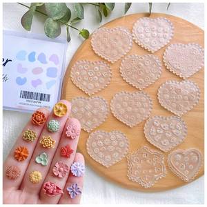 lot 8218 image: KEOKER Polymer Clay Molds - 12 Pcs Floral Polymer Clay Molds for Jewelry Making, Mini Clay Molds, Polymer Clay Molds for Polymer Clay Earrings Decoration (Substitute Polymer Clay Cutters) (12PCS)