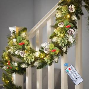 lot 9040 image: SHareconn 9FT Prelit Artificial Christmas Garland with Color Changing Lights and Timer by Remote Control and Batteries Operated for Mantle Stairs Fireplace Xmas Decoration, Indoor Outdoor, 9 FT, Snow