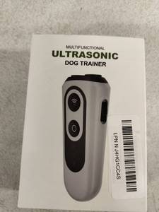 lot 6329 image: Multifunctional Ultrasonic Dog Trainer