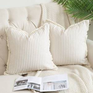 lot 10044 image: Hckot Throw Pillow Covers 22x22 Set of 2 Striped Pillow Covers with Fringe Chic Cotton Decorative Pillows Square Cushion Covers for Sofa Couch Bed Living Room Farmhouse Decor,Khaki