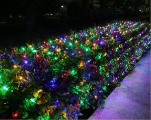 lot 10052 image: Joomer 12ft x 5ft 360 LED Christmas Net Lights, 8 Modes Bush Mesh Lights Connectable, Timer, Waterproof for Christmas Trees, Bushes, Garden, Outdoor Decorations (Green Wire, Multicolor)