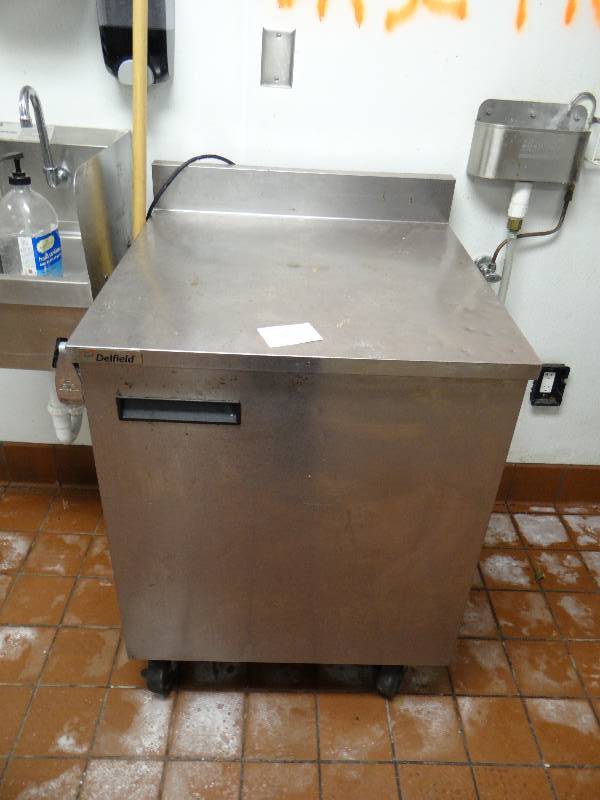 lot 2134 image: Delfield 27 Single Door Refrigerated Prep Table