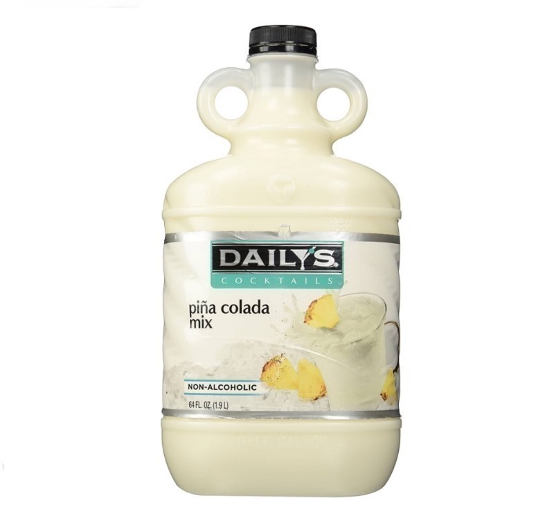 lot 82 image: 2 New Dailys Real Fruit Juice Cocktail Pina Colada Mixes 1.9L (Non-Alcoholic)