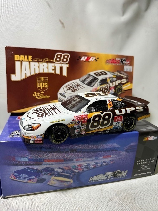 lot 156 image: New 2002 Action 10th Anniversary NASCAR #88 Dale Jarrett 2002 Taurus UPS 124 Limited Edition Scale StockCar