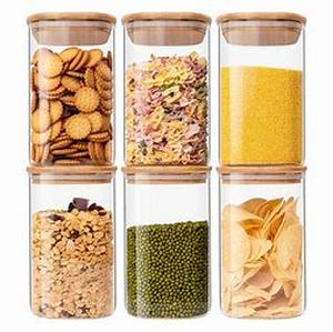 lot 16477 image: GLASS FOOD STORAGE JARS FOR CANDY SPICES AND MORE.
