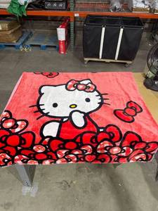 lot 7211 image: Hello Kitty Reverse Cloud Throw With Faux Fur