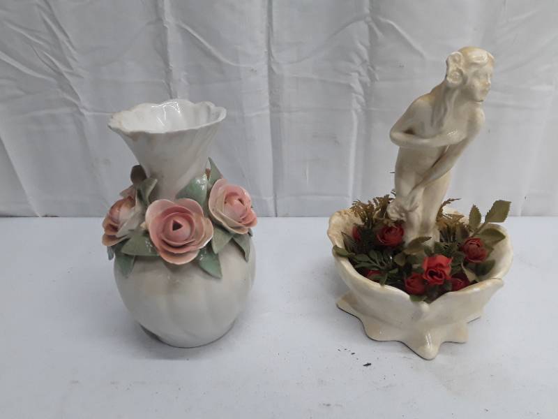 lot 55952 image: Vase and Lady in garden