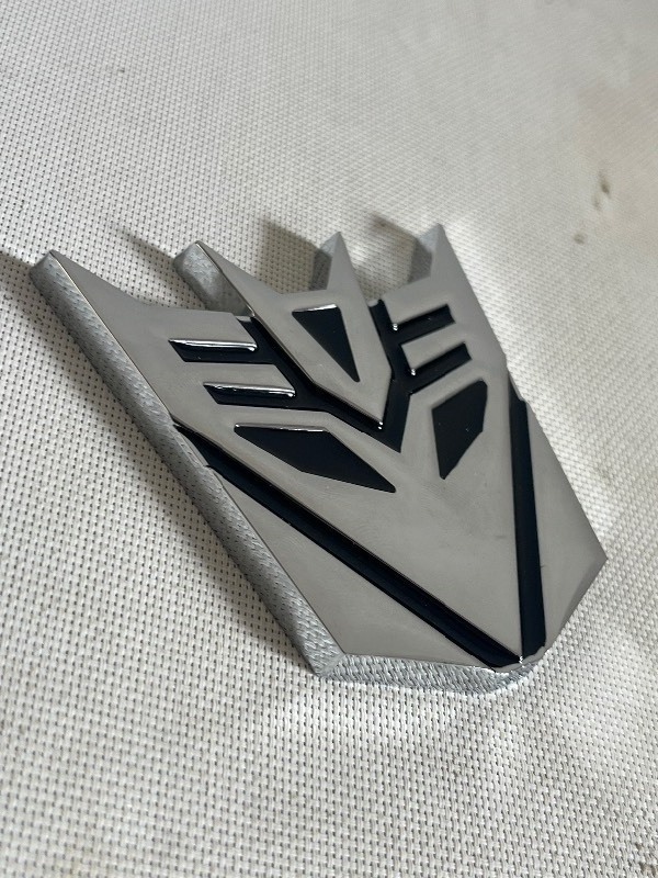 lot 542 image: PAIR OF 2 DECEPTICON METAL DECAL - PEEL & STICK HIGH QUALITY 2x3