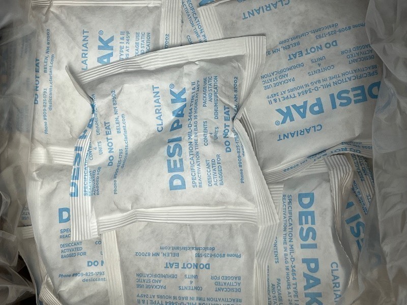 lot 101 image: 50 SM BAGS OF CLARIANT DESI PAKs - MOISTURE ABSORBER - GREAT FOR AMMO STORAGE CARD COLLECTIONS & MORE
