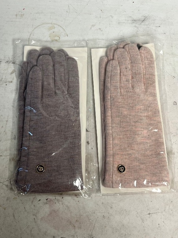 lot 66 image: 2 PAIRS OF COMFORT AND STYLISH WOMENS GLOVES ( PINK & PUR ) FUR INSIDE