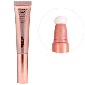 lot 2061 image: Charlotte Tilbury Pillow Talk BEAUTY LIGHT WAND�� Highlighter in Pillow Talk LightMedium at Nordstrom (some product has leaked out into the lid, feels mostly full though)