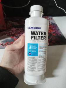 lot 2142 image: SAMSUNG Genuine Filter for Refrigerator Water and Ice, Carbon Block Filtration, Reduces 99% of Harmful Contaminants for Clean, Clear Drinking Water, 6-Month Life, HAF-QINEXP, 1 Pack
