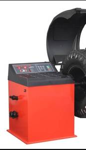 lot 170 image: Unused Wheel Balancer MD-2050 - Unassembled in Crate - 110V 60hz  220V 50hz Heavy Duty Automotive Wheel Balancer. Outside Clamping 10-22 Inside clamping 12-24 packing size L1W0.76H1.1m each