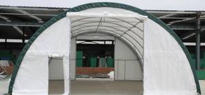 lot 154 image: Unused Galvanized Trussed Round Storage Shelter Model 304015R - W30xL40xH15 For Warehouses, Carport, Event and Exhibition Tents, Garages for Trucks, Buses, Vans, and Boats, Freight Warehouses, Commercial Tents and More $7k Retail