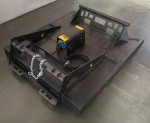 lot 229 image: Unused 66 Brush Cutter For Skid Steer & Tractor Loader - This Skid Steer Brush Cutter, or Brush Mower, is Designed to Remove Grass, Small Trees, & Brush, and is Compatible w Major Brand Skid Steers & Tractor Loaders w Skid Attachment Retails $5,600