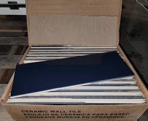 lot 239 image: Unused in Box - Daltile Color Wheel Linear Ceramic Wall Tile -  Four (4) Boxes of 28 Units of Navy-K189 - 4.25x12.875x.31in - 112 Units Total - Retail Price $1,425