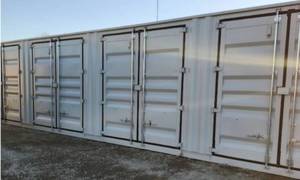 lot 300 image: 2024 One Way Use 40 Long High Cube Container with Double Rear & Four (4) Side Double Doors - Used One Time To Ship To Mother Road Auctions & Sales - Retail $17,999 -Our Forklift Can Load Container on a TrailerDelivery Available