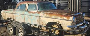 lot 126 image: Original Barn Find 1955 Dodge Royal Lancer 4 Door Car - Original Engine and Parts - Can Be Restored or Parted Out - This is a Straight Car That Has Everything A Restorer Wants The Chrome Pieces are in Great Shape and the Parts Alone Are Worth Thousands