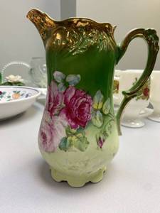 lot 2534 image: ANTIQUE STERLING CO PORCELAIN PITCHER GREENWHITE W PINK & RED ROSES GOLD TRIM