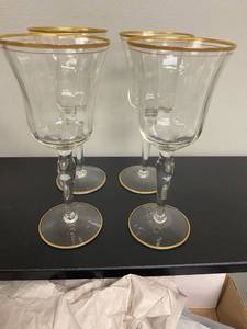 lot 2537 image: Set of (4) Antique long stemmed wine glasses with gold trim.