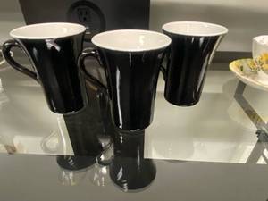 lot 2540 image: Set of (4) Black and white coffee mugs