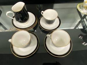 lot 2541 image: 3 China tea cups and Saucers with a cream container and saucer. (8) total pieces