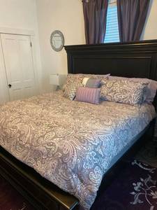 lot 10 image: Ashley Bedroom Suite- Bed Frame with Headboard, Footboard, and Sideboards, matching Nightstand, and matching Dresser with Mirror- Beautiful Set