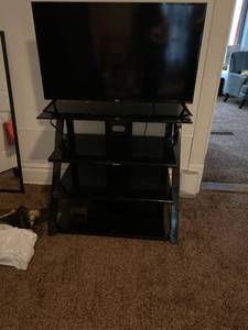 lot 15 image: Z-Line Tempered Black Glass multi-level TV Stand