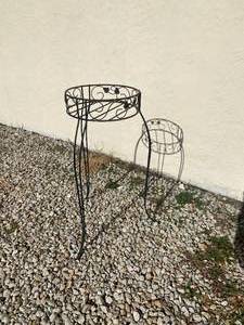 lot 2018 image: Round metal plant stand with decorative scrolls