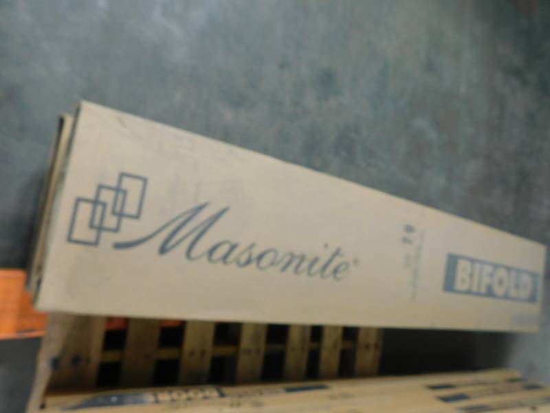 lot 8935 image: Lot of Masonite Bi Fold Doors 30 26