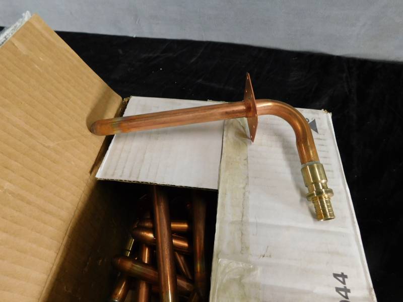 lot 9102 image: Lot of Eared Stub Out Elbow Copper