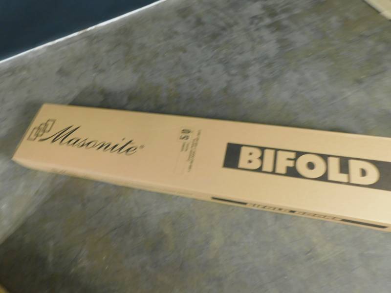lot 8940 image: Masonite Bi Fold Door 50 60
