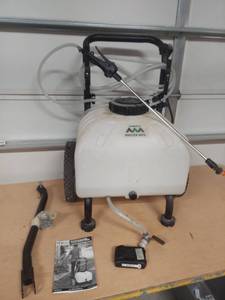 lot 1012 image: Revolt battery powered sprayer with charger - works