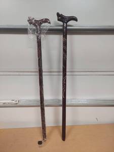 lot 1028 image: (2) canes