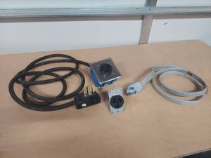 lot 1060 image: 220 Converter extension cord and range cord