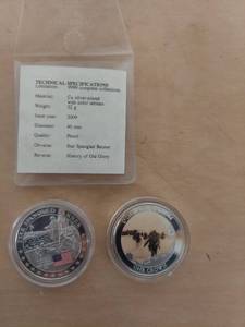 lot 1064 image: D-day colorized 1 crown coin and Star Spangled Banner Token