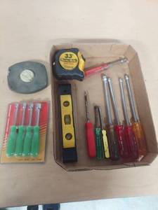 lot 1108 image: nut drivers, tape measures and level