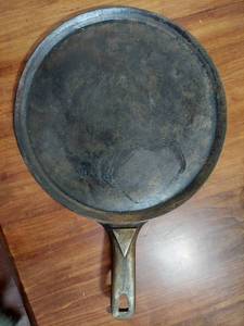 lot 6019 image: Coleman cast iron griddle