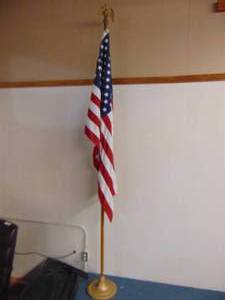 lot 1159 image: American flag with heavy base and pole