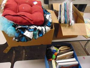 lot 1257 image: Boxes of clothes, books, hangers