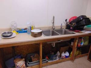 lot 1344 image: Contents of Counters - Roasters and cleaning supplies