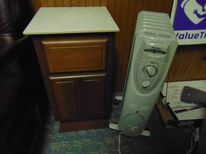 lot 1375 image: Pelonis heater and small stand