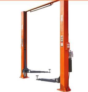 lot 3672 image: Unused TMG TMG-ALT100  Two Post Auto Lift Overhead 10,000lb (with Box B inside)