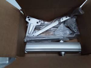 lot 30242 image: Box of Door Closure Parts, may have 2 complete plus parts, but not sure