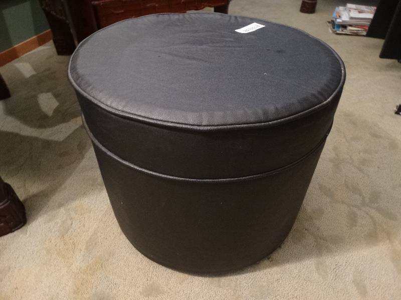 lot 355 image: Round Black Ottoman.