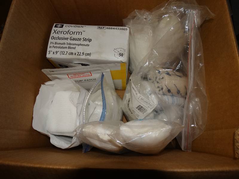 lot 387 image: Box of Unused Gauze Strips, Patches, Bandages, & Peri-Cold Instant Cold Packs.